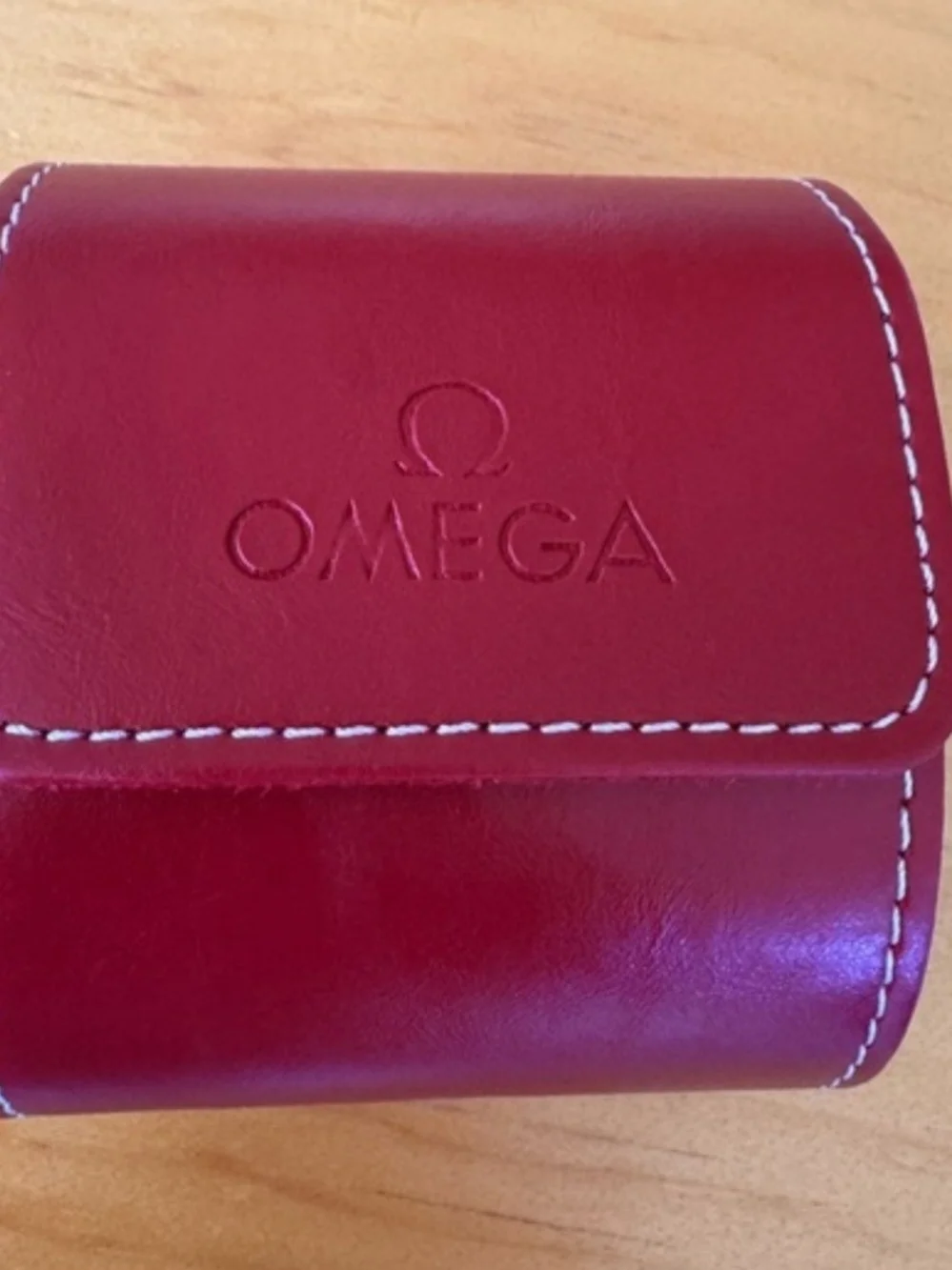 Omega compact red